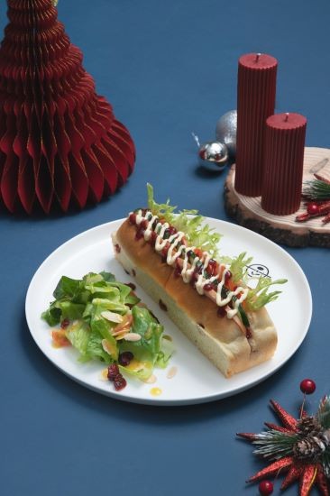 Grandpa's Chicken Sandwich Savoury fans rejoice because we haven't forgotten about you! Get your sandwich fix with smoked chicken, cucumber, tomato and jellied cranberry sauce encased in a jingle bun. Available at RM22.00 each