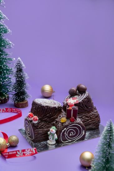 Happy Holiday Log Tis' the season to feast on our iconic chocolate log; generously filled with chocolate mousse and chocolate ganache for all your holiday reunions. Available as a whole (RM159.00/1.0 kg) and slices (RM15.90/slice) 